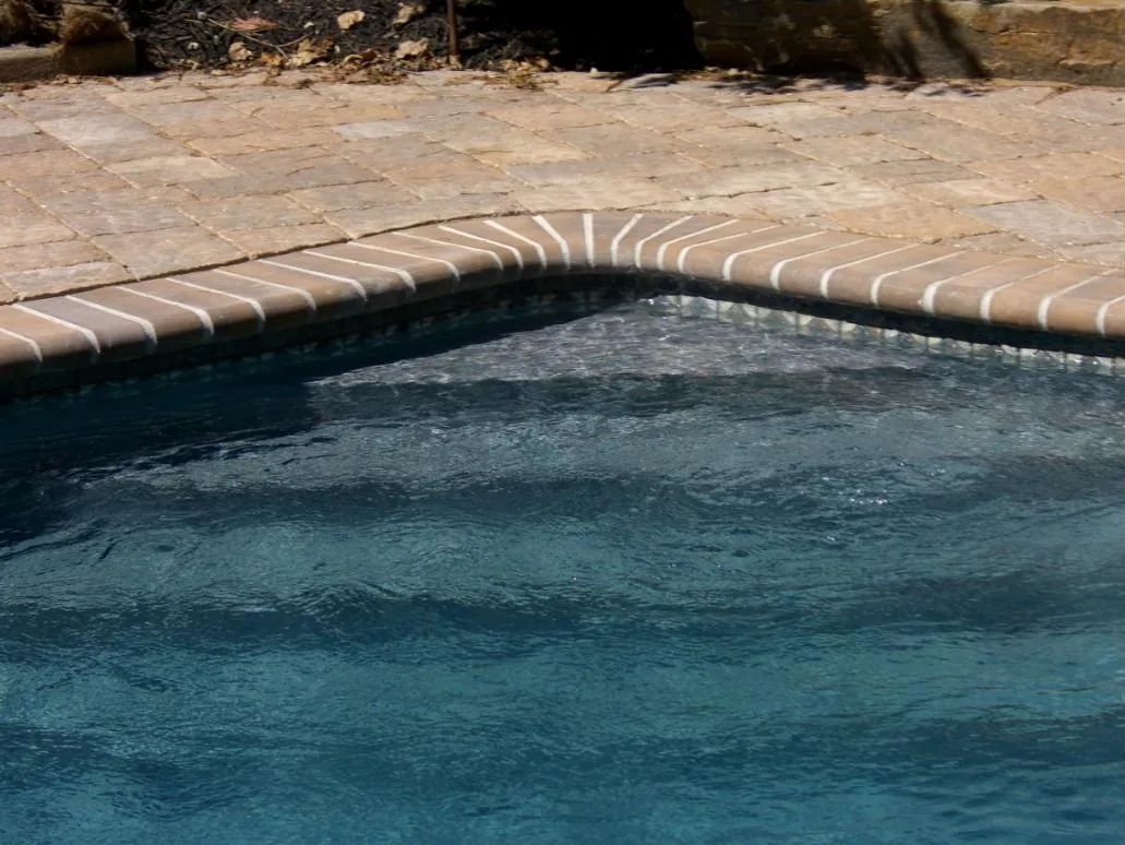 The same pool at a low angle along the coping
